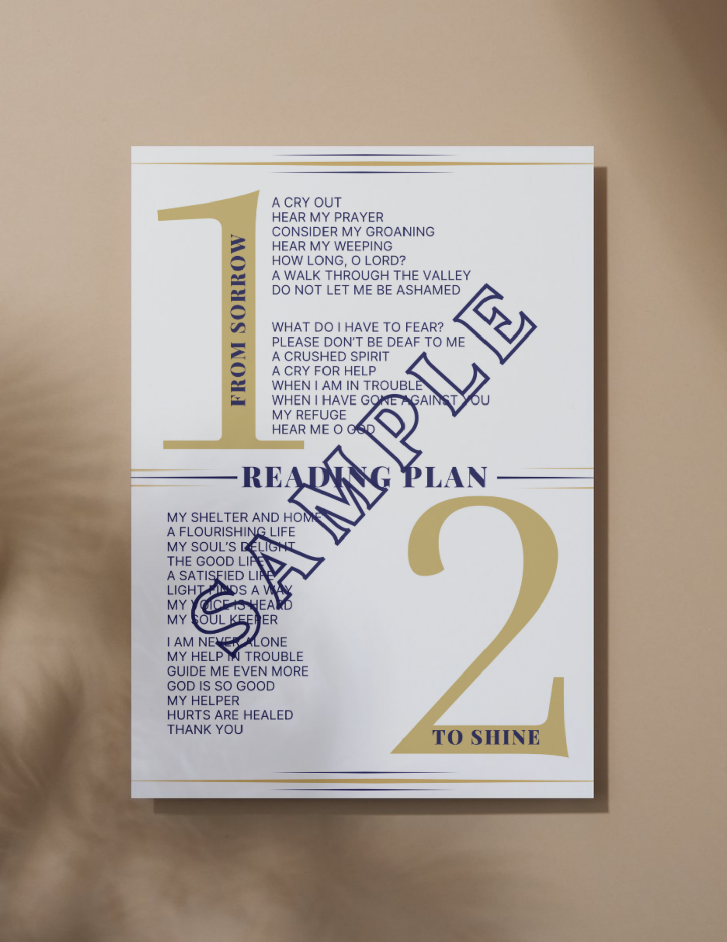 a one page card sitting on a table that is a bible reading plan on psalms to go alongside the lectio divina companion journal